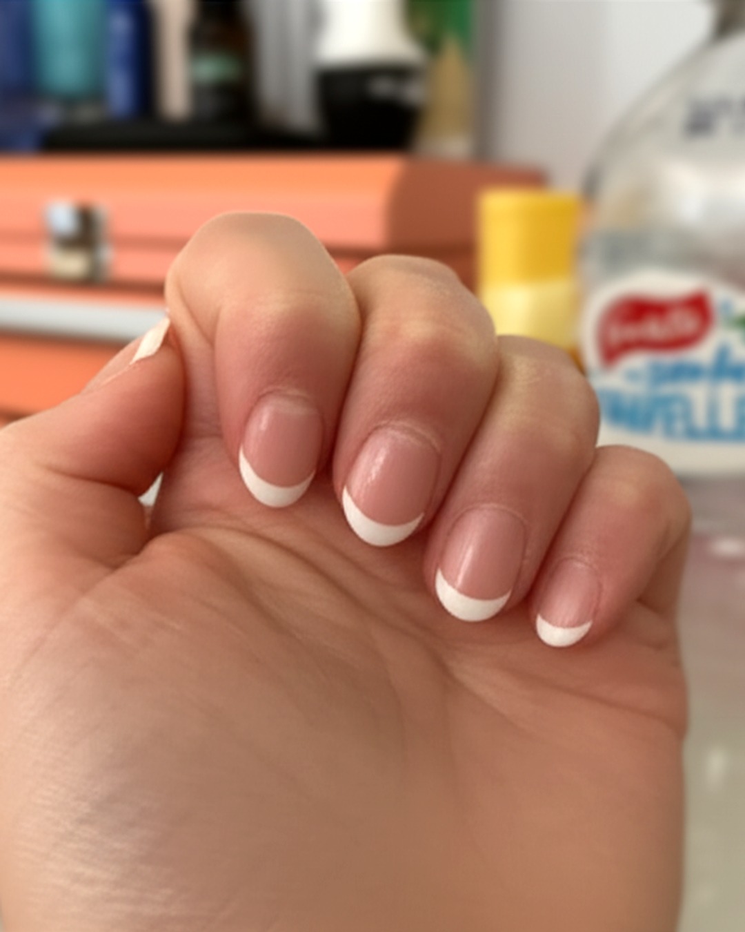 white oval French Tip Nails - short glossy white french tip nails with natural base, oval shape, short length, glossy finish