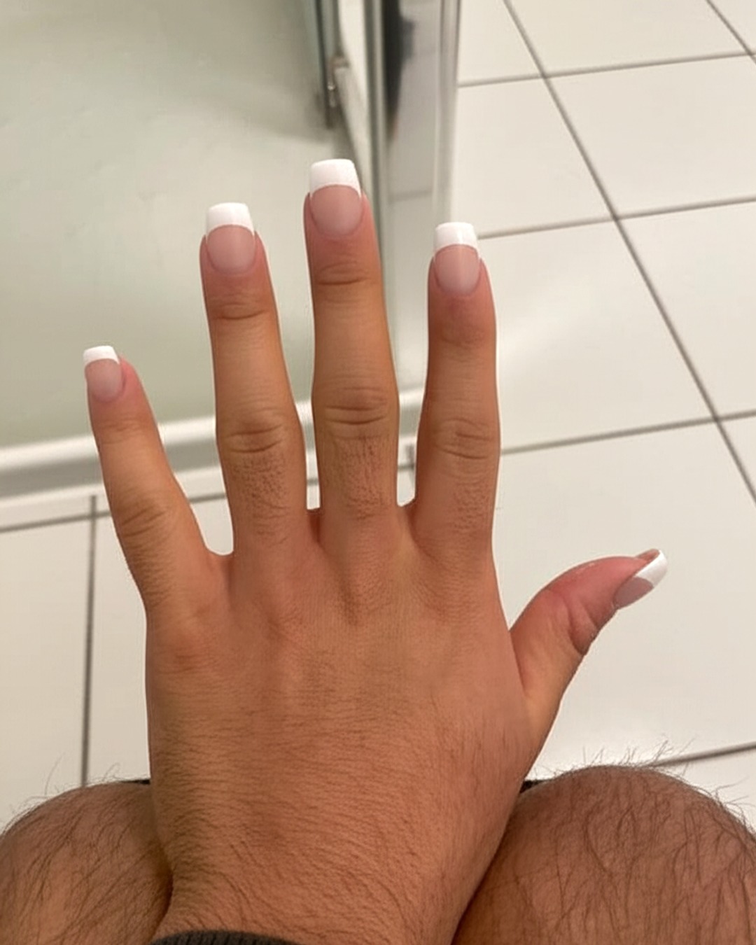 white french tip nails with natural base, square shape, medium length, glossy finish