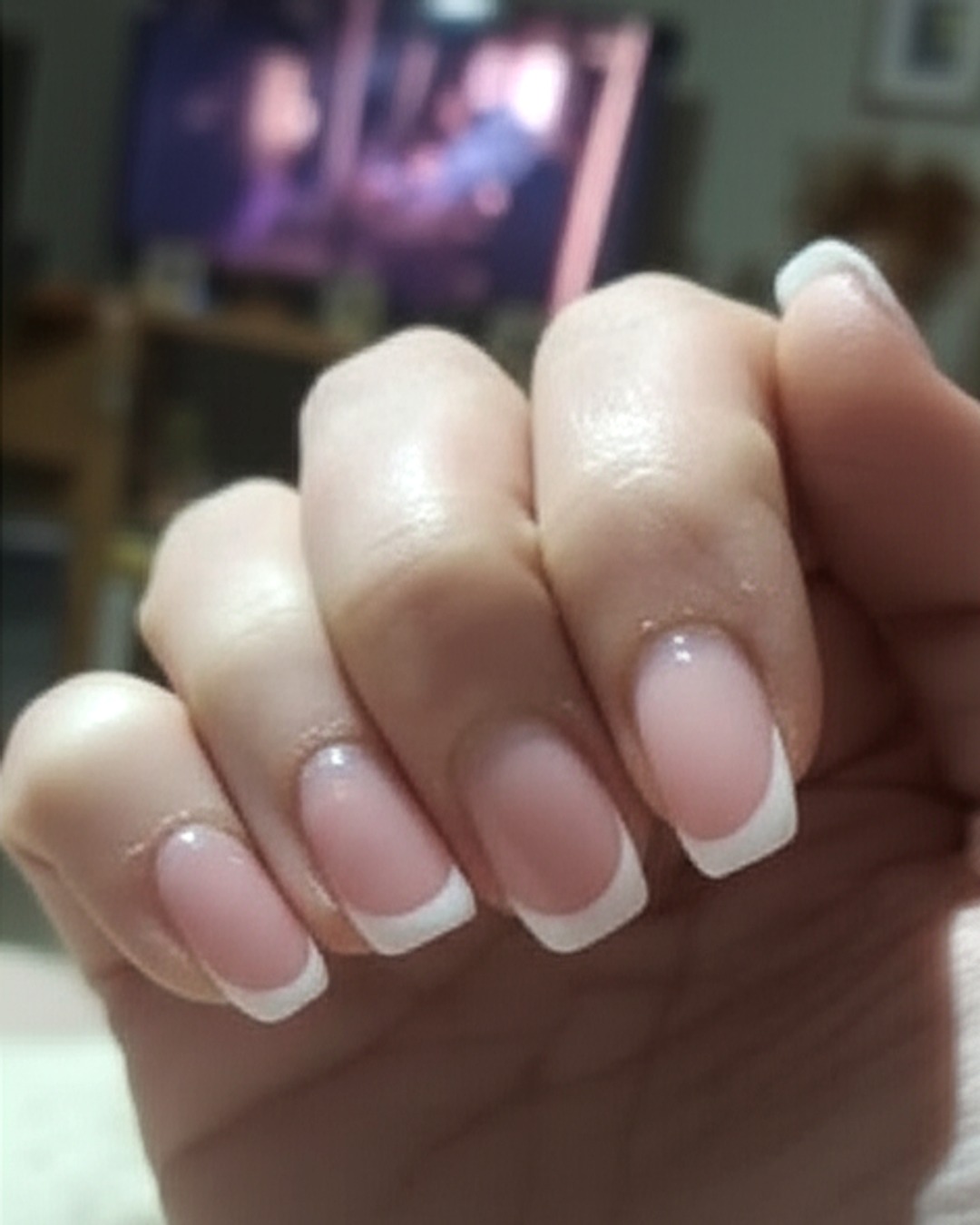 white french tip nails with natural base, square shape, medium length, glossy finish