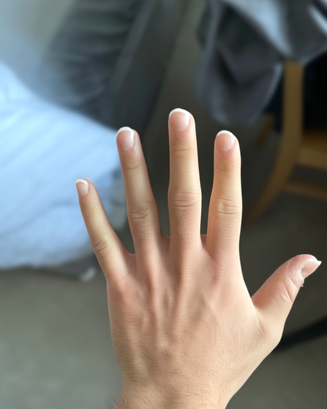 white squoval long french tip nails with natural base and glossy finish - virtual try-on result