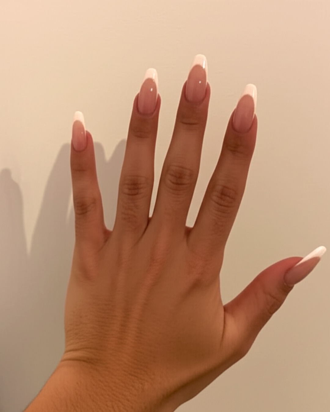 white almond French Tip Nails - extra-long glossy white french tip nails with french-ombre base, almond shape, extra-long length, glossy finish