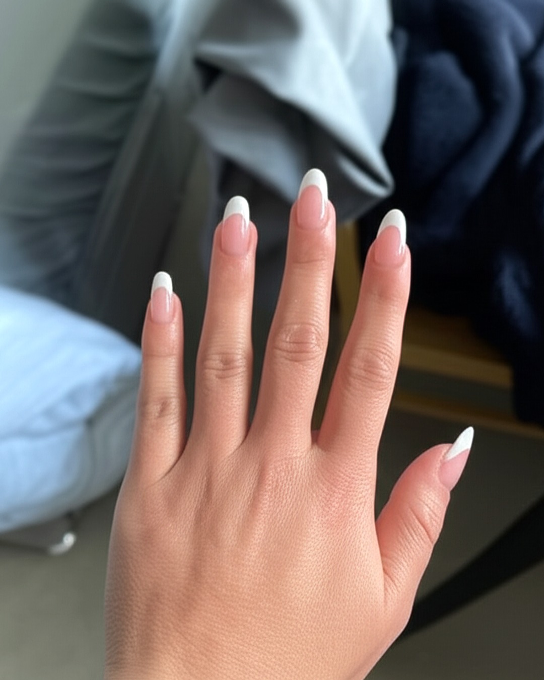 white squoval extra-long french tip nails with blush-pink base and glossy finish - virtual try-on result