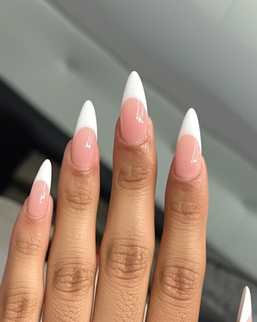 white almond French Tip Nails - extra-long glossy white french tip nails with ombre-pink base, almond shape, extra-long length, glossy finish