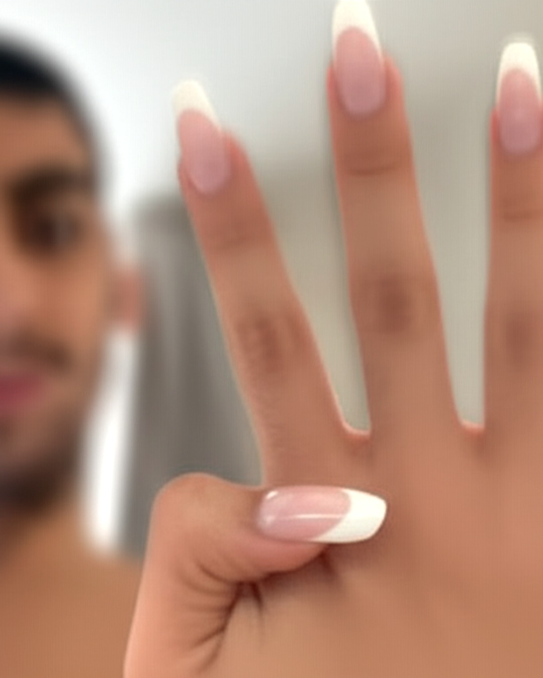 white squoval extra-long french tip nails with blush-pink base and glossy finish - virtual try-on result